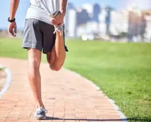 Person Warming Up Before Running